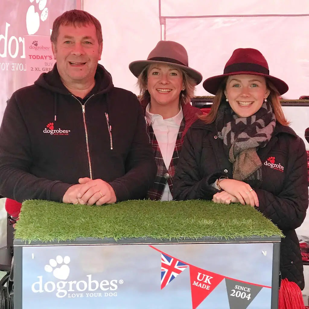 Dogrobes family team at event promoting British-made dog drying coats, Snoods and drying mitts