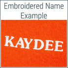 Close-up of an orange Dogrobe MAX dog towelling robe personalised with an embroidered name in white thread