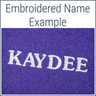 Close-up of a purple Dogrobe MAX dog towel robe personalised with an embroidered name in white thread