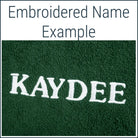 Close-up of a green Dogrobe MAX dog drying robe personalised with an embroidered name in white thread