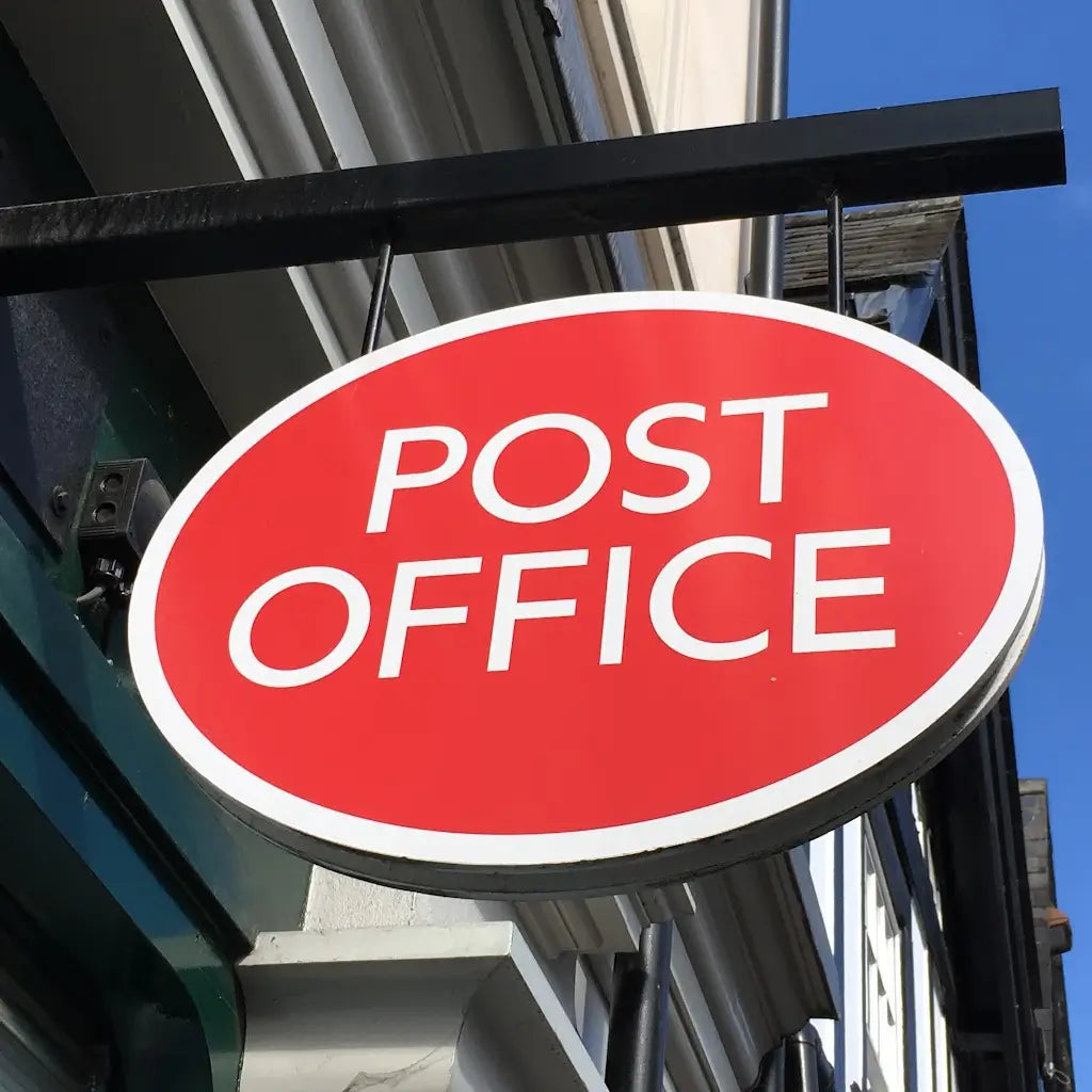 Post Office sign showing where to drop off a Dogrobes return