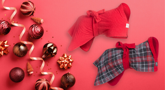 Best sellers: Red Dogrobe Original and Tartan Dogrobe from the Exclusive Collection, on a red background with Christmas baubles