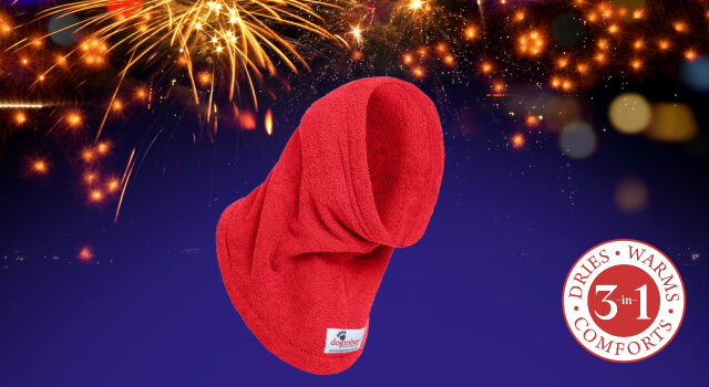 A Red Snood against a fireworks background. The dog Snood can also help calm and comfort dogs on Bonfire Night.