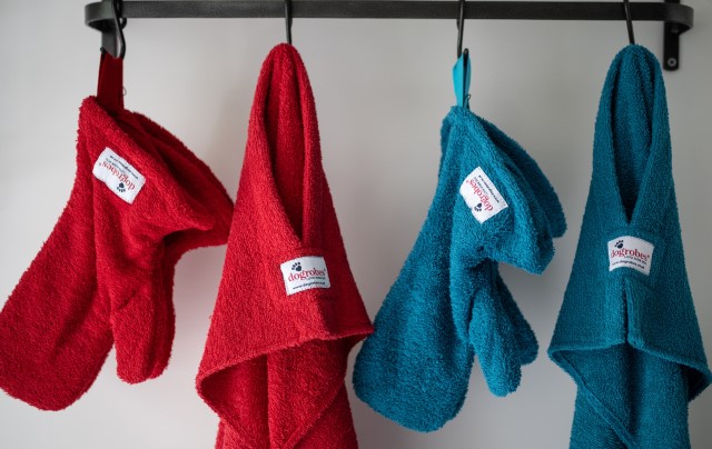 Red and Teal Dogrobes and Gauntlets hanging up to dry